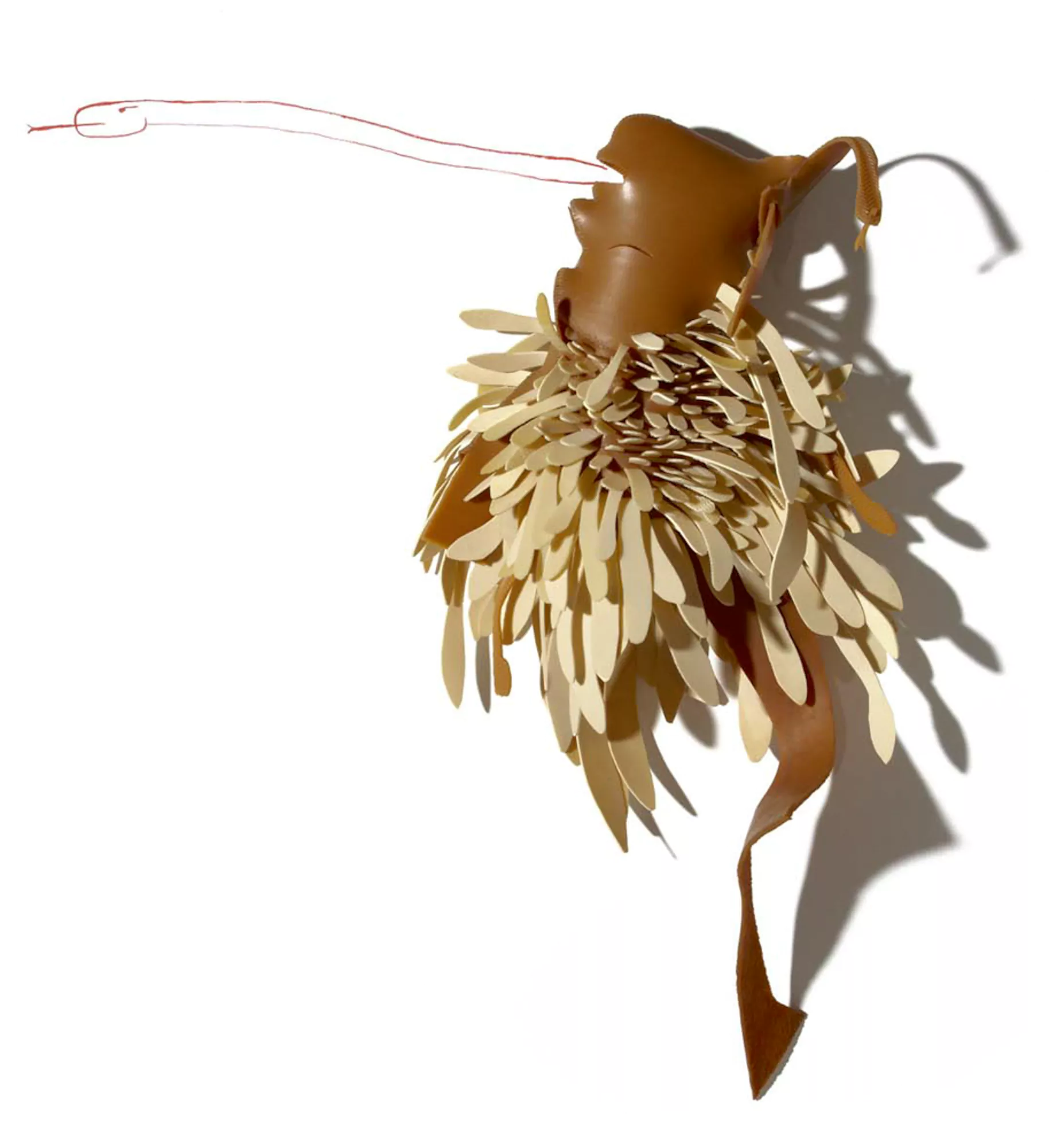 Coyolxahuqui decapitada manando una serpiente roja de su boca